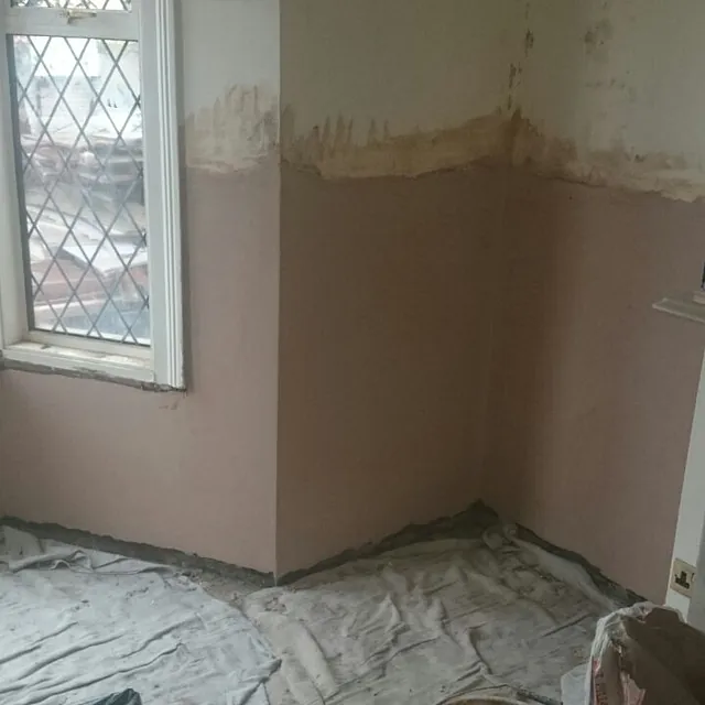 A damp patch that indicates rising damp.